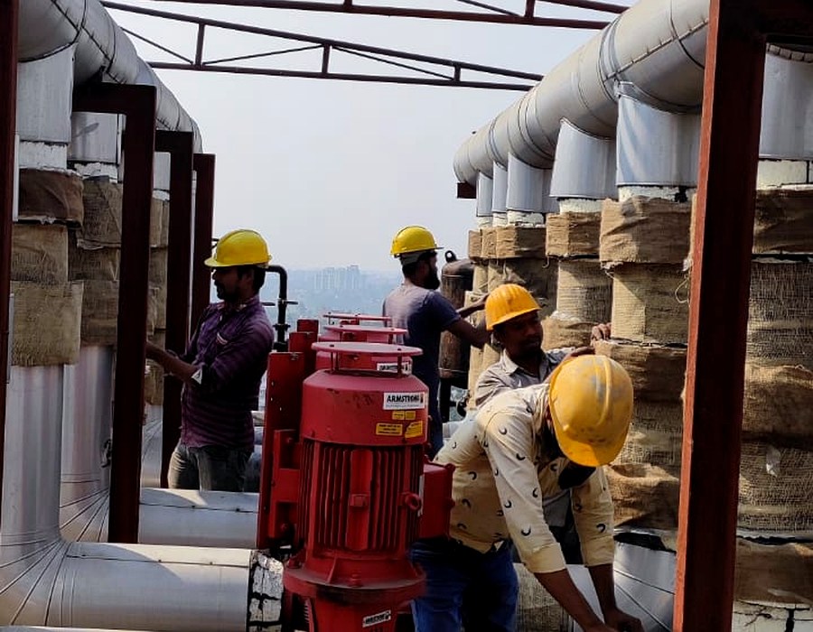 NGOC engineers working on rooftop HVAC installation